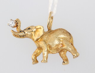 A G & G Appleby limited edition yellow metal 18k diamond charm in the form of an elephant, set with a 0.1ct diamond, no. 3 of 100, 10.7 grams, 30mm 