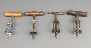 Three 19th Century sprung twin pillar corkscrews and 1 other twin pillar corkscrew  marked D.R.G.M. 