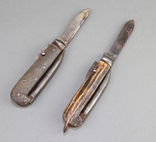 A Butler of Sheffield 2 bladed folding Jack knife with marlin spike and horn grip, a Rogers 2 bladed folding Jack knife with marlin spike 