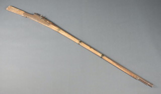 A 19th Century native matchlock gizelle with 127cm barrel, ram rod, some rust in places 