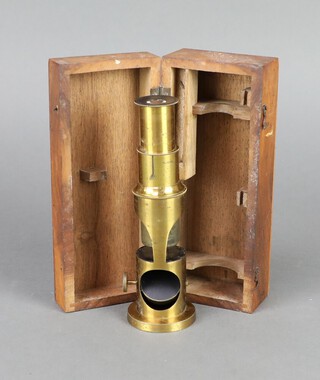 A 19th Century gilt metal single pillar students microscope contained in a wooden box