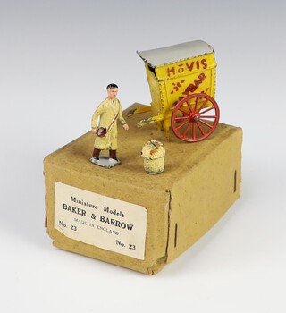 Taylor and Barrett, a baker and barrow set no.23 comprising cart, baker and basket of bread, boxed 