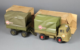 Asharna Toys, a Leyland covered military truck (reference 503) in olive green with 45 decals and 45th Fusileer decals to the doors, together with a covered military trailer (reference 2618) in Army green, both with token post out boxes