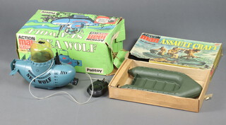 Action Man by Palitoy, a boxed assault craft no.34132 including 3 oars, outboard motor and the craft, together with a boxed Seawolf submersible submarine no. 34730 including surface air pump and tube, snorkel mask and tube, the front camera is present with some parts of the frontal camera rig present 