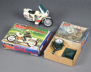 Action Man by Palitoy, a search light no.34726 boxed, together with a Police motorcycle no.34740 boxed 