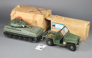 Action Man by Palitoy, an Army Landrover (with instructions and spare tyre), together with a Scorpion tank, both in mailout Stars Reward boxes 