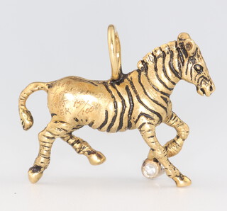 A G & G Appleby limited edition yellow metal 18k charm in the form of a zebra, set with a 0.10ct diamond, no. 5 of 100, 27mm 11.7gr