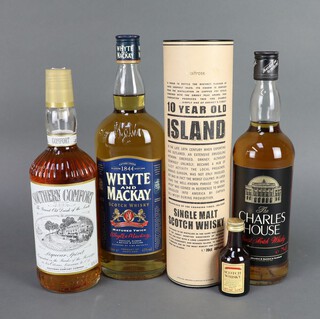 A 70cl bottle of Waitrose 10 year old single malt whisky boxed, a litre bottle of Whyte & Mackay blended whisky, a 70cl litre bottle of Charles House blended whisky, 70cl bottle of Southern Comfort whisky liqueur and a 5cl bottle of fine blended scotch whisky 