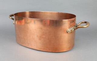 A 19th Century oval, twin handled copper fish kettle/saucepan 19cm h x 42cm w x 28cm  