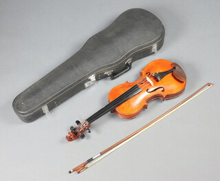 A Stentor violin with 14" two piece back, labelled Stentor, complete with bow and fibre case
