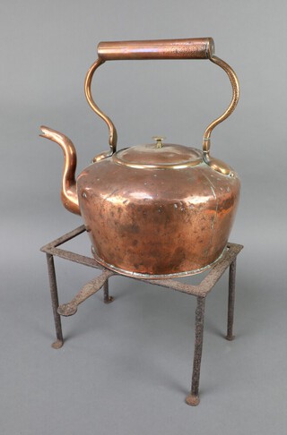 A 19th Century copper kettle with brass finial (some dents) 15cm x 36cm together with a rectangular iron footman 