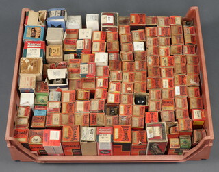 A collection of Brimar, Marconi and other boxed valves contained in a bread crate 