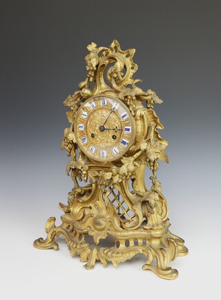 A 19th Century French 8 day striking on bell mantel clock contained in a gilt ormolu Rococo style case, the case numbered 3414, 41cm h x 31cm w x 14cm d, complete with pendulum (no key) 