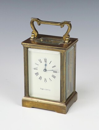 Mappin & Webb, an 8 day carriage timepiece, having a 5cm enamelled dial with Roman numerals, marked Mappin & Webb, contained in a gilt case complete with key, 11cm h x 8cm w x 6cm d 