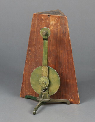 W E and F Newton Opticians, a 19th Century metal hand cranked instrument marked W E and F Newton Opticians 3 Fleet Street, Temple Bar, London on a tripod base 27cm h x 16cm together with an associated metal triform base 4cm x 14cm 