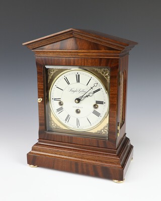 Knight and Gibbins, a Georgian style chiming bracket clock with 13cm enamelled dial, Roman numerals, contained in a mahogany portico shaped case 32cm h x 22cm w x 13cm d (complete with key) 