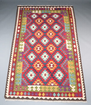 A red, green, blue and white ground Maimana Kilim rug with all over diamond design 251cm x 153cm 