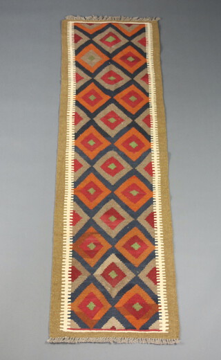 A black, brown and tan ground Maimana Kilim runner with diamond decoration 194cm x 58cm 