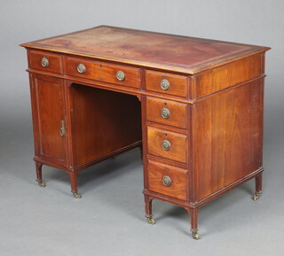 An Edwardian mahogany desk with inset red leather writing surface fitted a long frieze drawer, 1 pedestal fitted 4 short drawers the other a cupboard to the side, 74cm h x 108cm w x 60cm d  