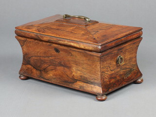 A William IV rosewood tea caddy of waisted sarcophagus form on bun feet 18cm h x 35cm w x 21cm d 