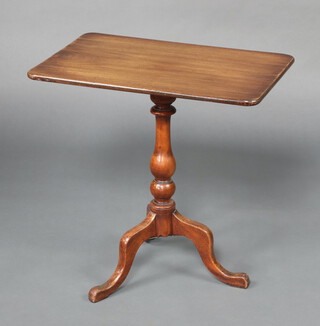 A 19th Century rectangular mahogany snap top wine table on a pillar and tripod base 68cm h x 44cm diam. 