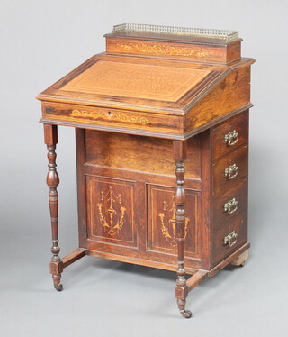 A Victorian inlaid rosewood Davenport with stationery box and pierced gilt metal 3/4 gallery, the pedestal fitted 4 drawers, raised on turned supports 89cm h x 56cm w x 56cm d 