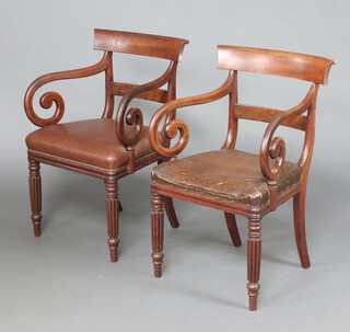 A pair of 19th Century mahogany bar back carver chairs with overstuffed seats, raised on turned and reeded supports 87cm h x 55cm w x 46cm d 