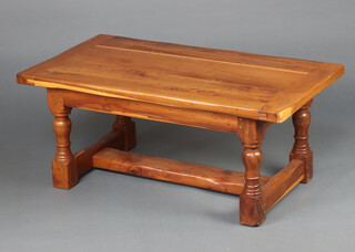 A yew rectangular refectory style coffee table on turned and block supports with H framed stretcher 46cm h x 107cm w x 58cm d 