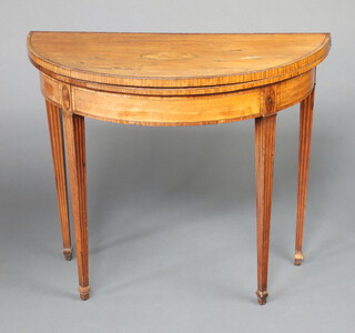 A Georgian inlaid and crossbanded satinwood card table raised on fluted supports, spade feet 76cm h x 91cm w x 45cm d 