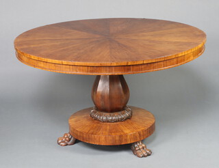 A Victorian circular rosewood snap top breakfast table raised on bulbous turned column, circular base, paw feet 127cm diam. 