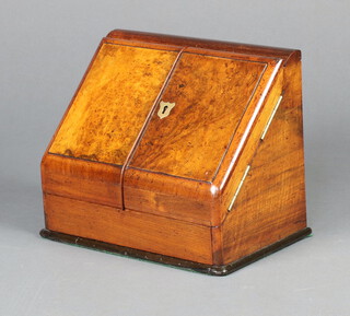 A Victorian figured walnut wedge shaped stationery box, having a stepped interior with inkwell, the base fitted a drawer 23cm h x 30cm w x 19cm d 