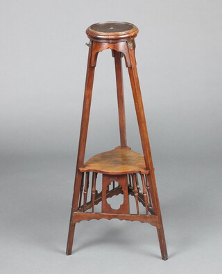 An Edwardian circular mahogany 2 tier jardiniere stand with triangular base and bobbin work decoration 79cm h x 17cm diam. 