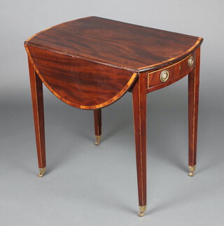 An oval Georgian cross banded mahogany Pembroke table fitted a drawer, raised on square tapered supports, brass caps and casters 70cm h x 75cm w x 50cm d 