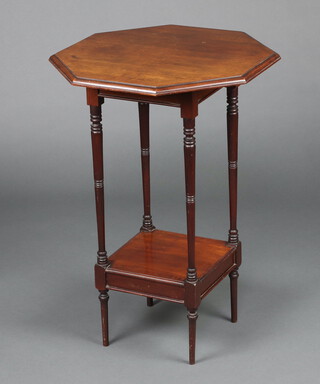 An Edwardian octagonal 2 tier occasional table raised on turned tapered supports  70cm h x 48cm w x 48cm  