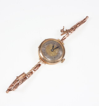 A lady's 9ct yellow gold wristwatch on a ditto bracelet, gross weight including movement and glass 17.2 grams 