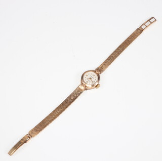 A lady's 9ct yellow gold Majex wristwatch on a ditto bracelet, gross weight including glass 13.4 grams