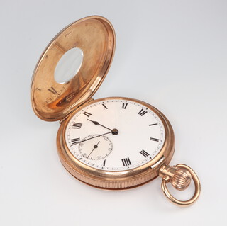 A 9ct yellow gold mechanical half hunter pocket watch with enamelled numerals and seconds at 6 o'clock, contained in a 48mm case, gross weight 90.5 grams, Birmingham 1924 