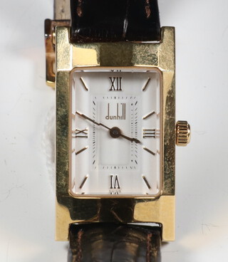 A lady's gilt cased Dunhill wristwatch with leather strap and clasp in original box 