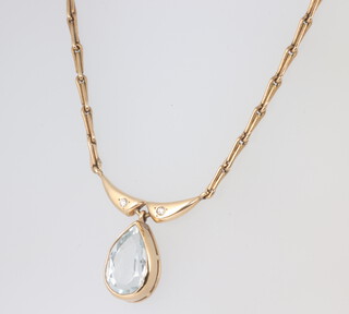 A 9ct yellow gold topaz and diamond necklace together with matching earrings, gross weight 12.5 grams, necklace 38cm 