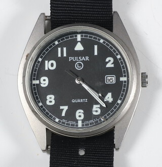 A British Military issue Pulsar wristwatch, the reverse stamped 6645/99 60252627 PO3822/99 contained in a 37mm case with webbing strap 