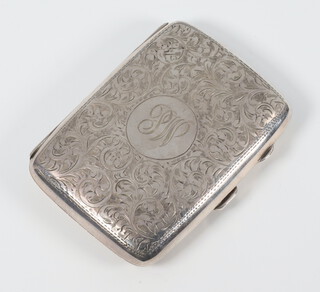 A silver engraved scrolled cigarette case with monogram Birmingham 1925, 80 grams gross 