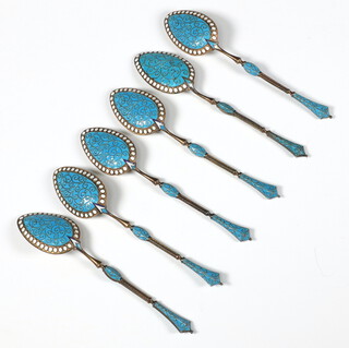 A set of 6 Russian enamelled teaspoons with scroll decoration 