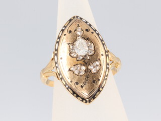 A Victorian yellow metal and enamelled mourning ring set with a mine cut diamond approx. 0.25ct and 21 (ex 22) diamond chips 4.8 grams, size E 1/2