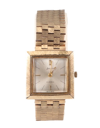 A gentleman's mid-century Accurist wristwatch contained in a 9ct gold case and bracelet, gross weight including glass and extra link 43.24 grams 