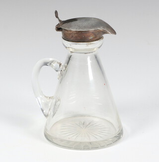 An Edwardian silver mounted spirit bottle 10cm, rubbed marks 