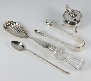 A silver mounted glass handled salad server London 1895, a pair of nips, spoon, mustard, 104 grams 