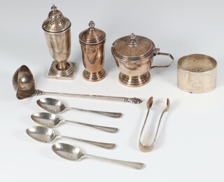 A silver pepper Sheffield 1934, 2 other condiments, a napkin ring, nips, 4 spoons and a ladle, 316 grams gross