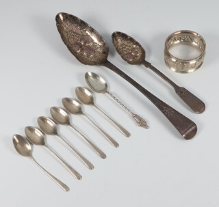 A George III silver berry spoon London 1809, 8 spoons and a napkin ring 137 grams