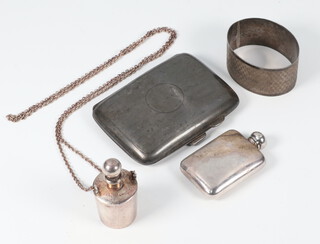 A silver cigarette case Birmingham 1924, a napkin ring and 2 scents, gross weight 141 grams 