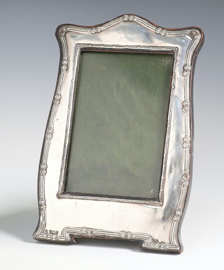 A George V silver photograph frame with floral decoration 20cm 